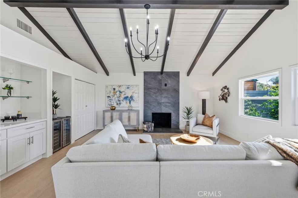 Living room with Italian veneer fireplace